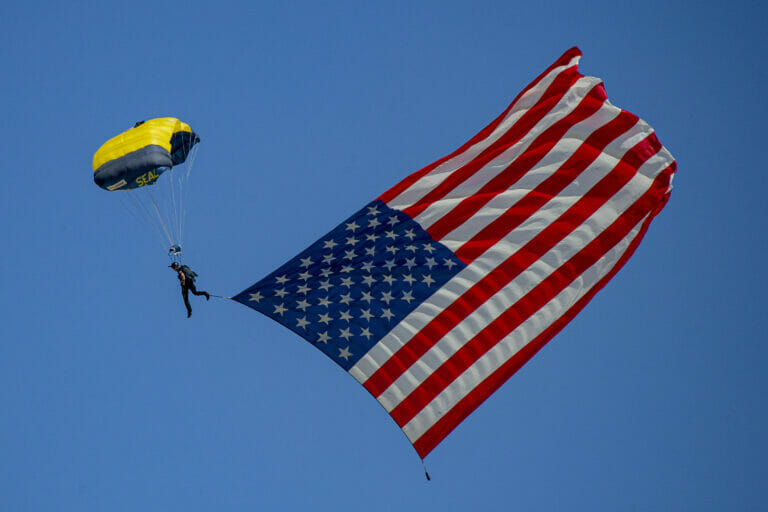 The U.S. Navy Parachute Team, nicknamed the Leap Frogs, conducts an aerial demonstration from a U.S. Army C-147A at the 2022 Marine Corps Air Station Miramar Air Show at MCAS Miramar, San Diego, California, Sept. 23, 2022. The Leap Frogs Navy Parachute Team is made up of active-duty Navy SEALs, Special Warfare Combatant-craft Crewmen and support personnel. The theme for the 2022 MCAS Miramar Air Show, “Marines Fight, Evolve and Win,” reflects the Marine Corps’ ongoing modernization efforts to prepare for future conflicts. (U.S. Marine Corps photo by Lance Cpl. Zachary Larsen)