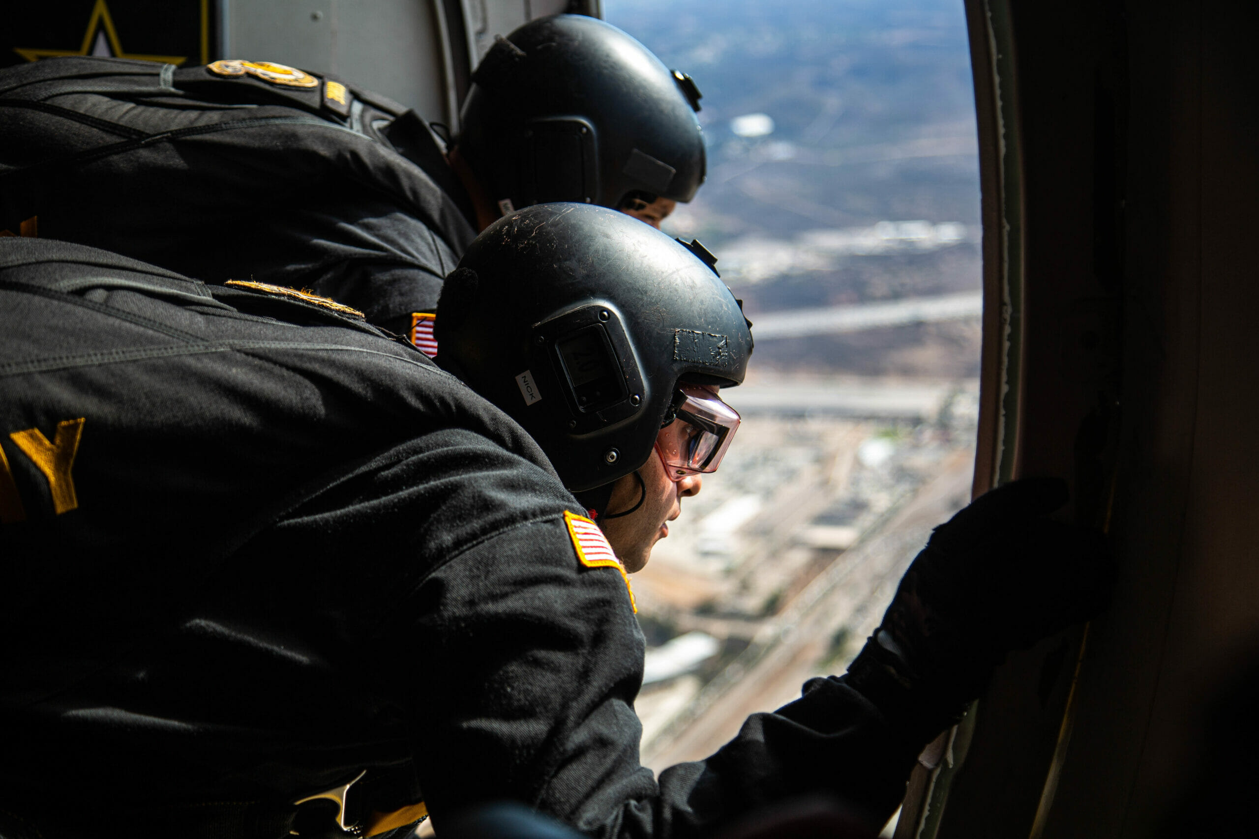 U.S. Army Parachute Team members prepare to jump at the 2022 Marine Corps Air Station Miramar Air Show at MCAS Miramar, California, Sept. 24, 2022. Nicknamed the Golden Knights in 1962, “Golden” signifies the gold medals the team won in international competitions, and “Knights” alludes to the team’s ambition to conquer the skies. The Golden Knights perform in more than 100 events per year.  The theme for the 2022 MCAS Miramar Air Show, “Marines Fight, Evolve and Win,” reflects the Marine Corps’ ongoing modernization efforts to prepare for future conflicts. (U.S. Marine Corps photo by Cpl. Tyler W. Abbott)